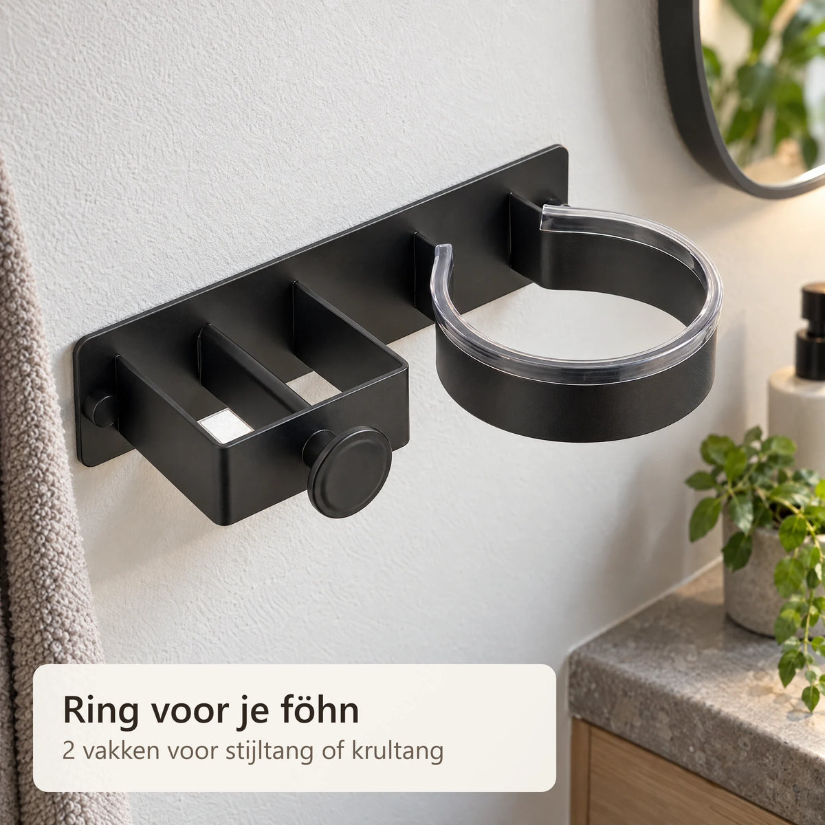 Lege zwarte föhnhouder met twee vakken en een ring
