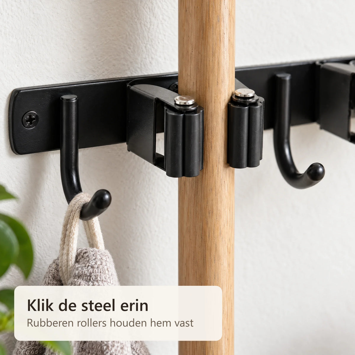 Klem met rubberen rollers en een haakje