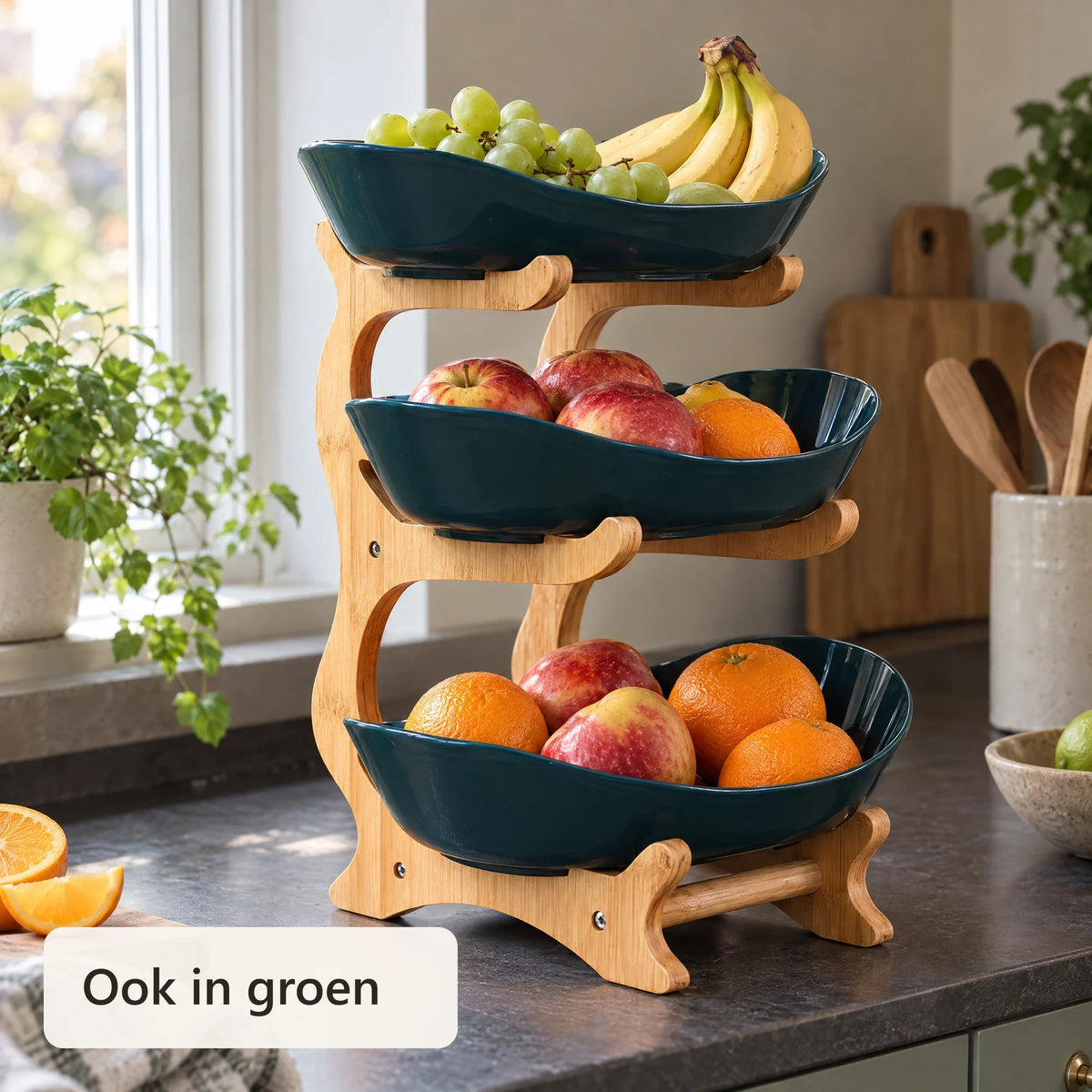 Groene fruitetagère met 3 schalen vol fruit
