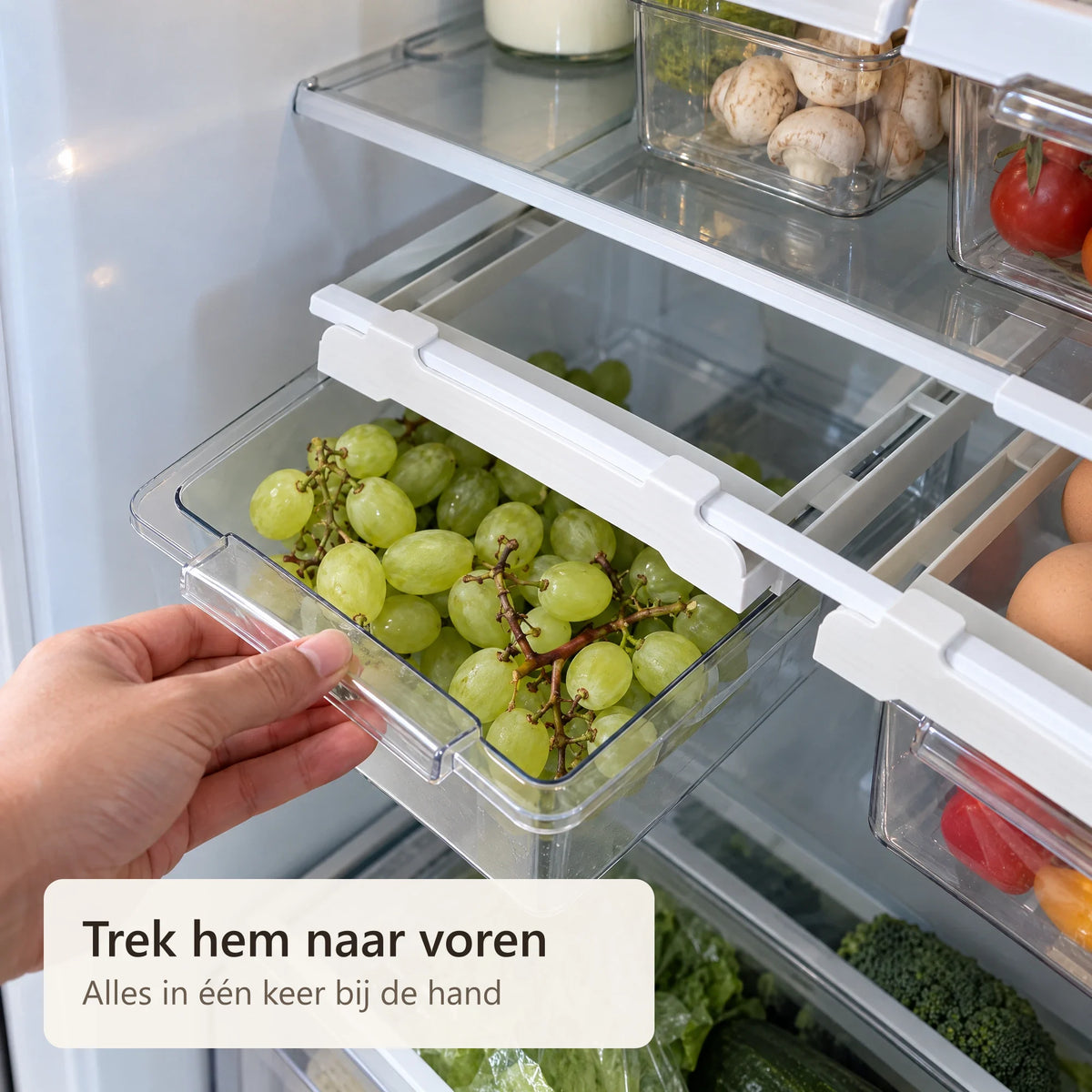 De lade met druiven wordt naar voren getrokken