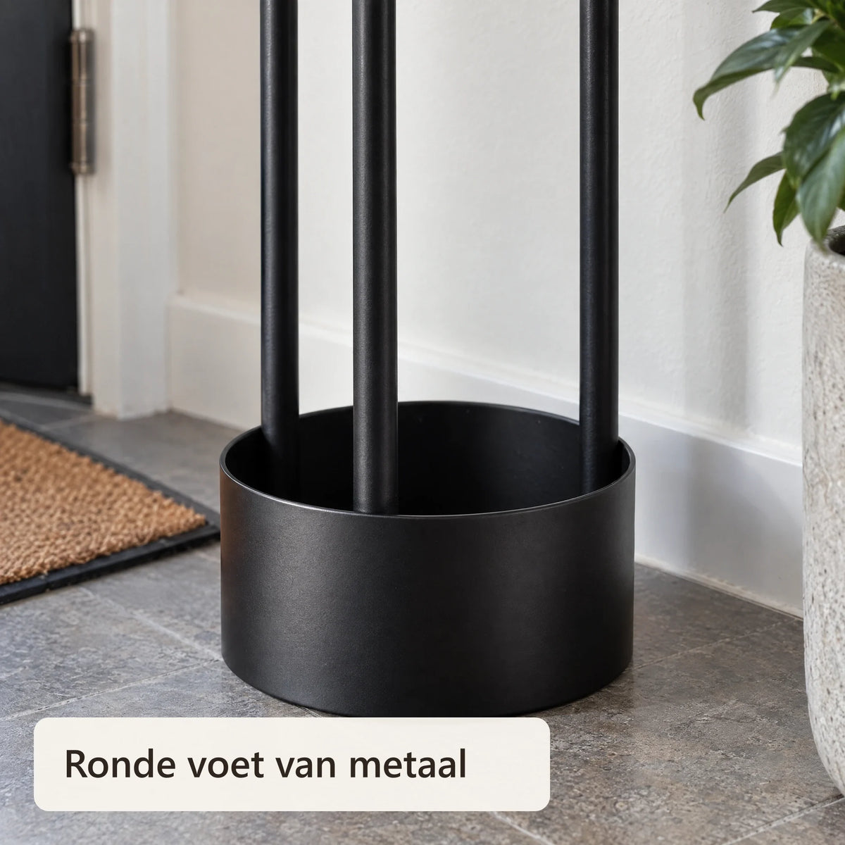 Close-up van de ronde voet van de paraplubak